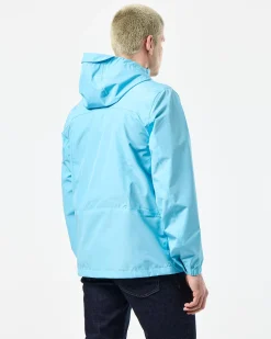 Football + Festivals Wasserdichte Pack-Away-Jacke Ocean Wave Blue