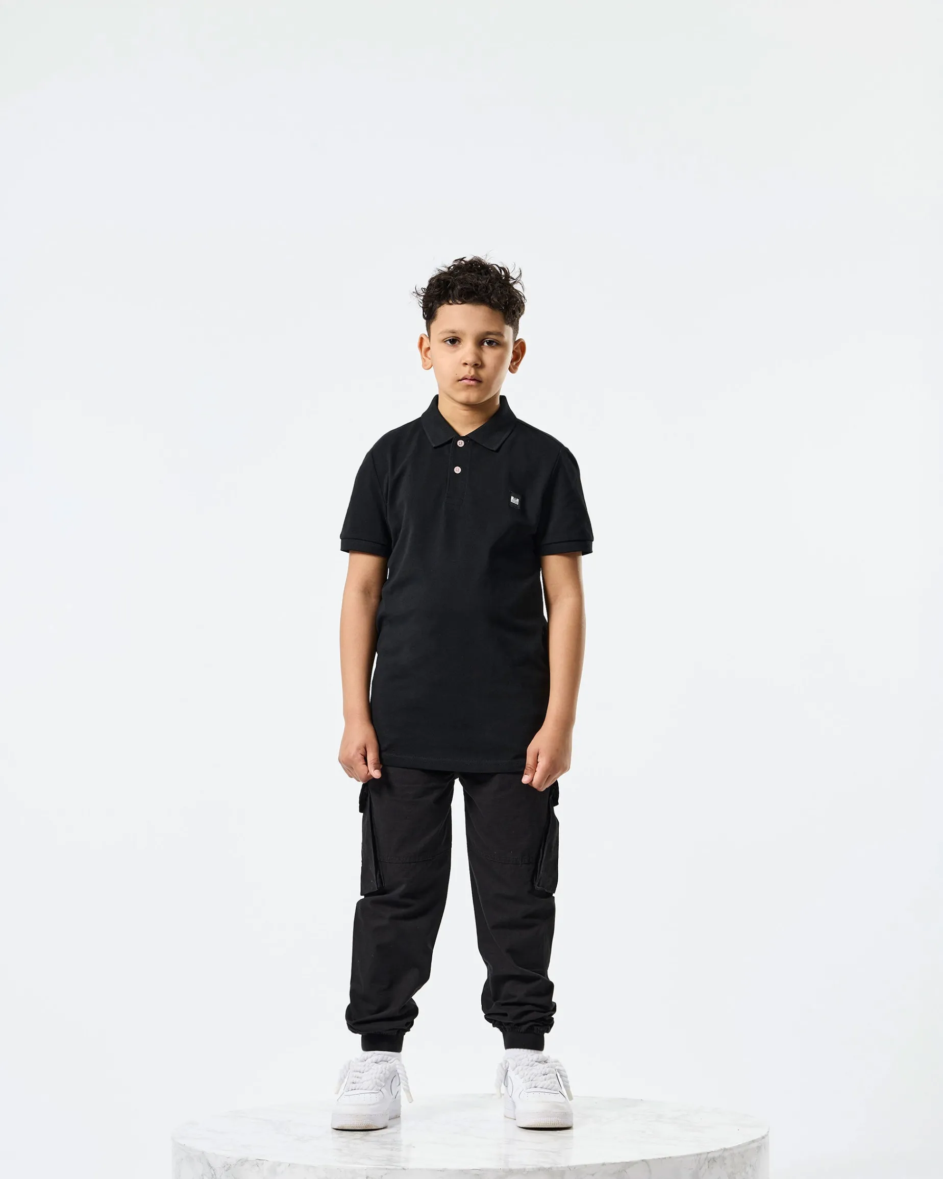 Kinder Caneiros Poloshirt Schwarz