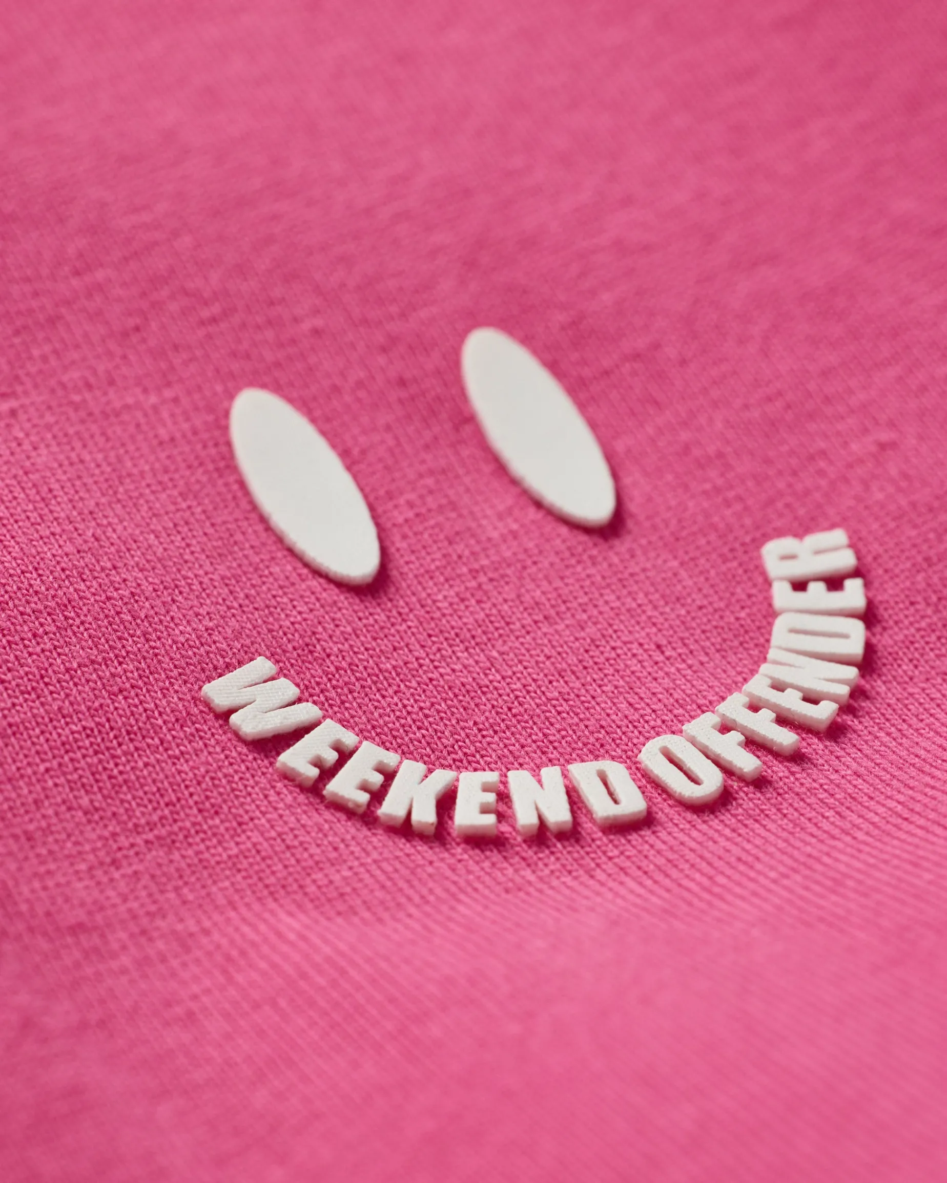 T-Shirt mit Smile-Grafik in Bonbonrosa